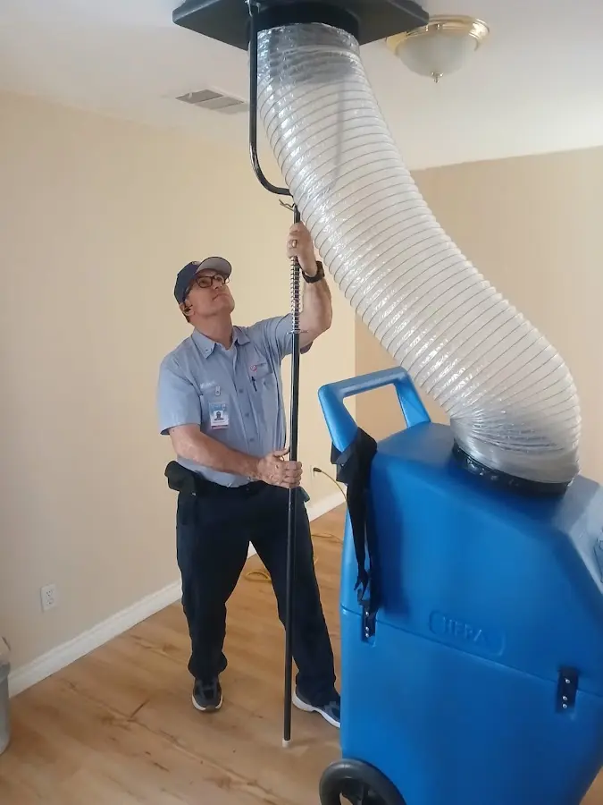 HVAC Installation technician using HEPA equipment in Pleasant Garden